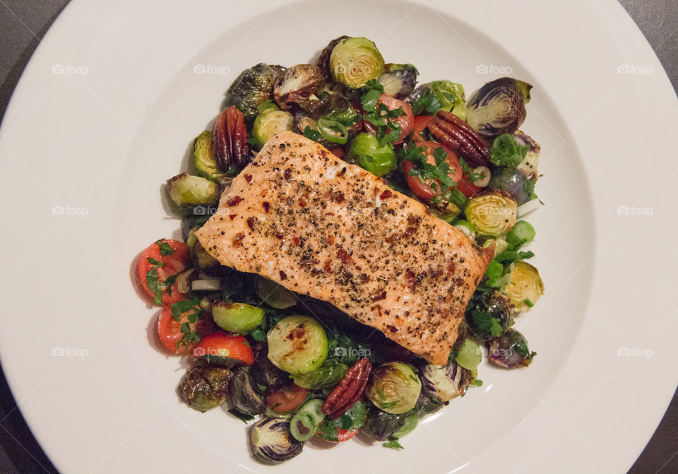 Salmon and sprouts and pecans