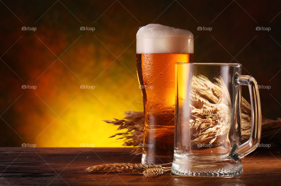 Composition of beer, cricket glass and wheat