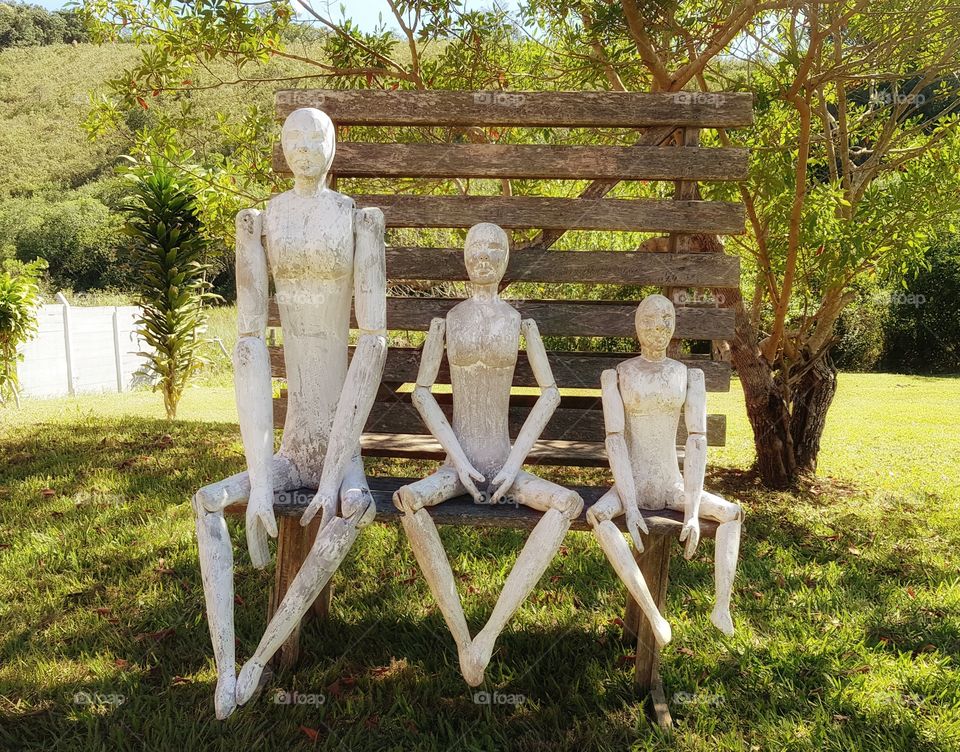 Wooden dolls on the park