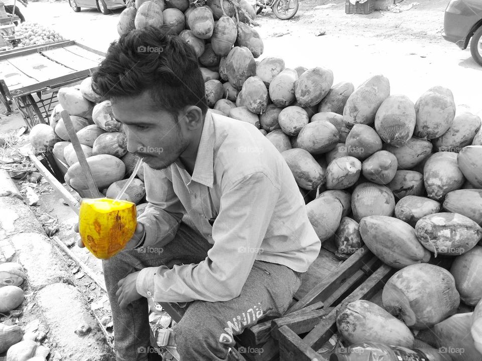 Drinking coconut water