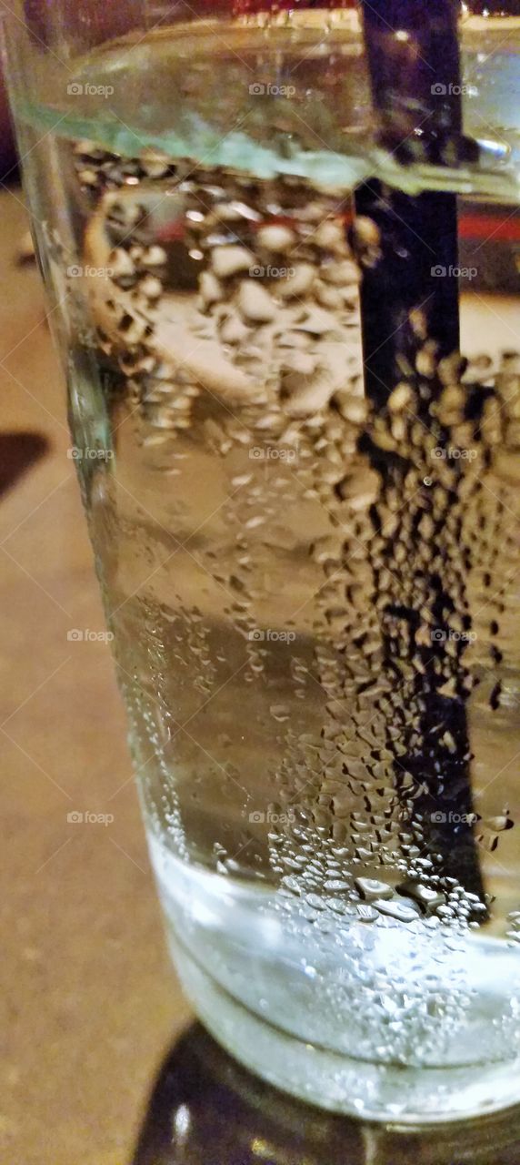 Refreshing cold glass of ice water