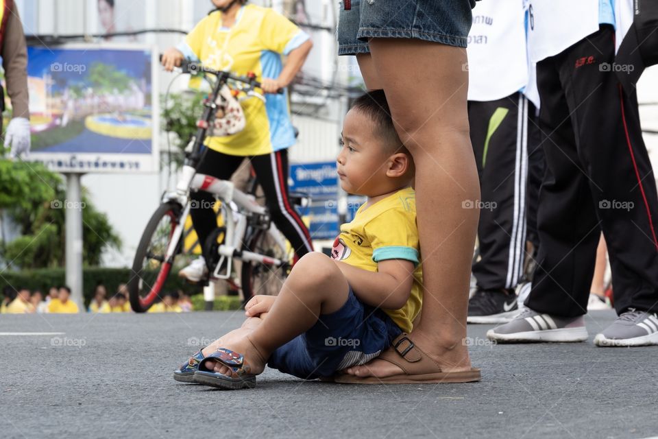 Kid sit to see Thailand bike festival