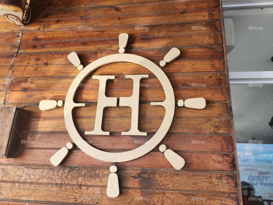 H signage