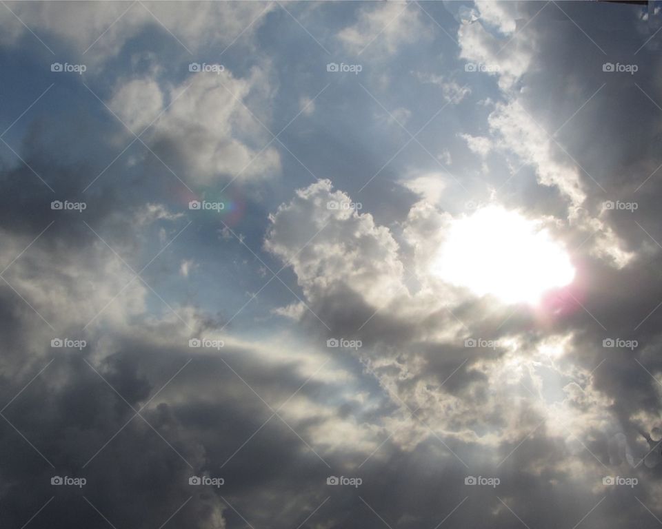 Stormy Clouds with Sun Coming Through