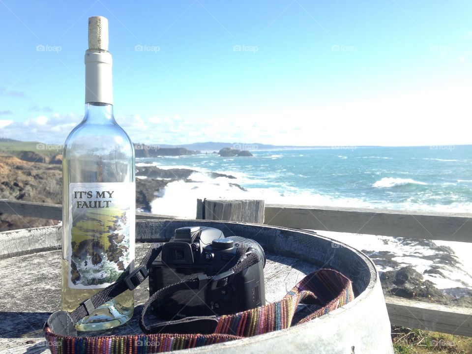 Wine, Camera and Ocean Views

