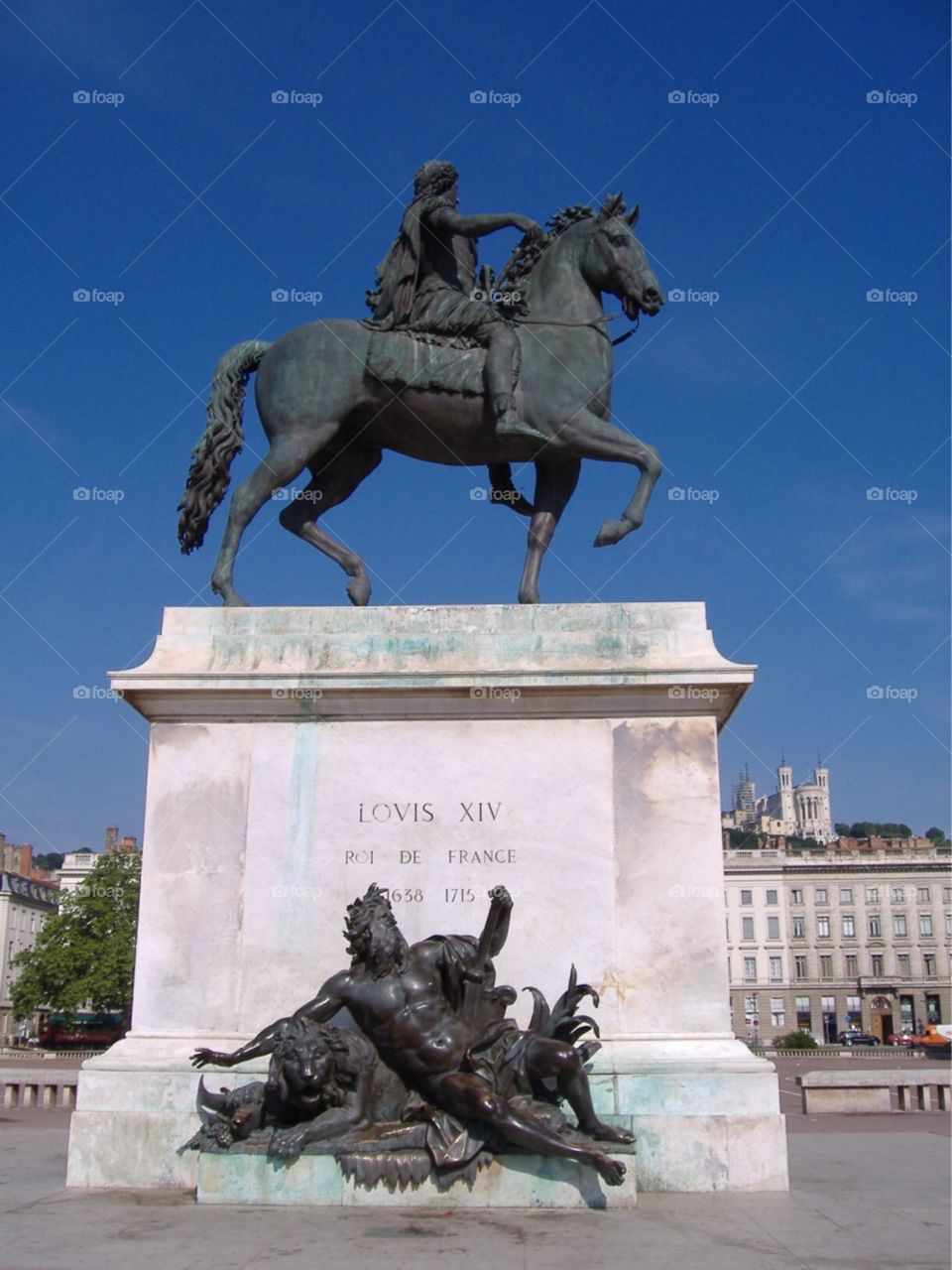 Statue of Louis XIV, Roi de France in a plaza. Lyon, France. 