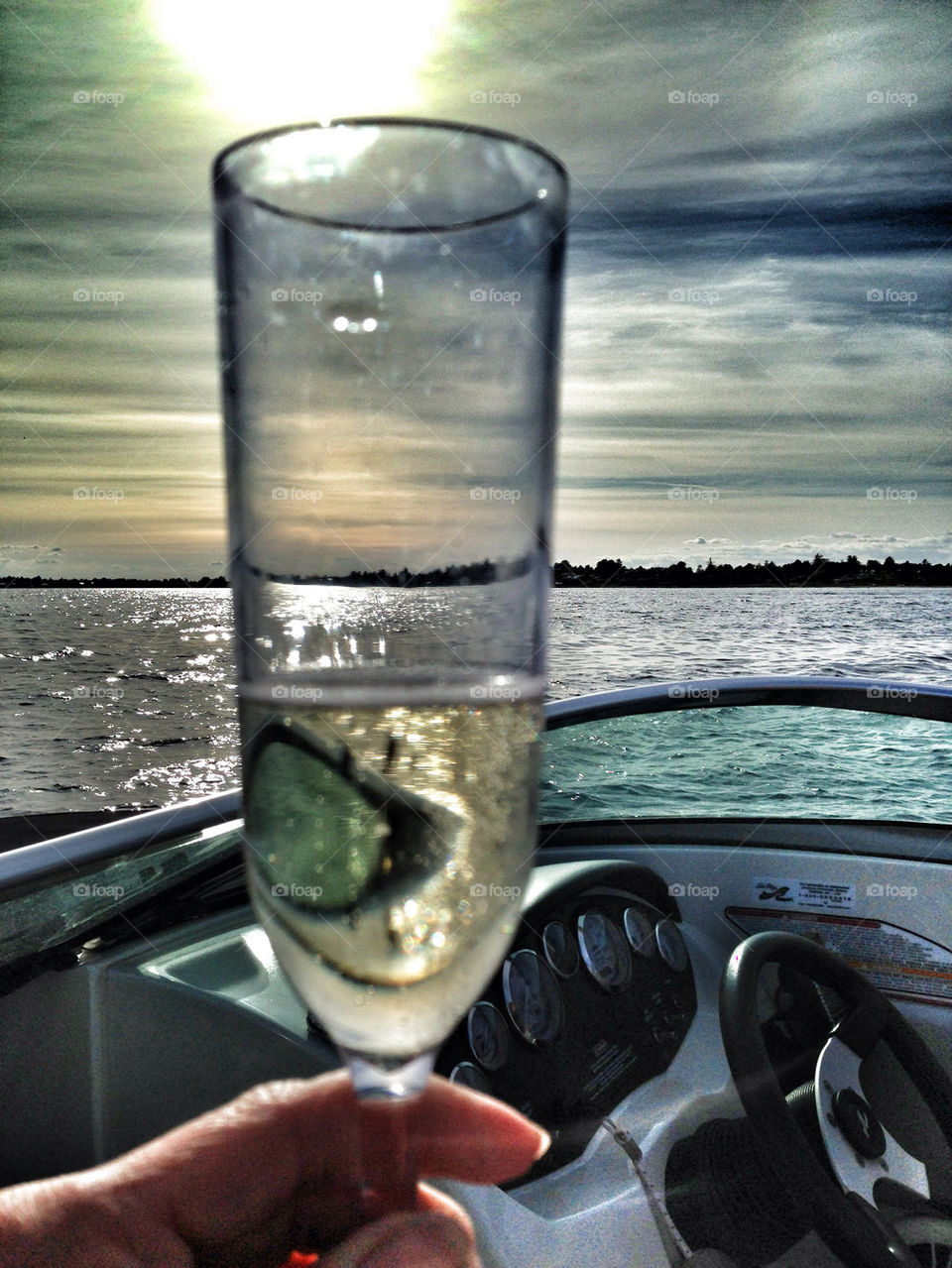 ENJOYING CHAMPAGNE ON THE SEA