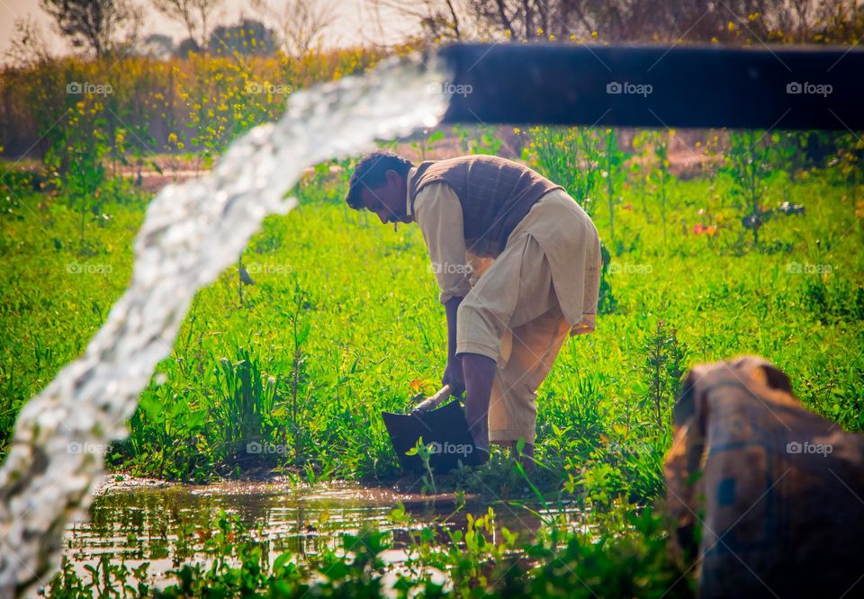 man work in water