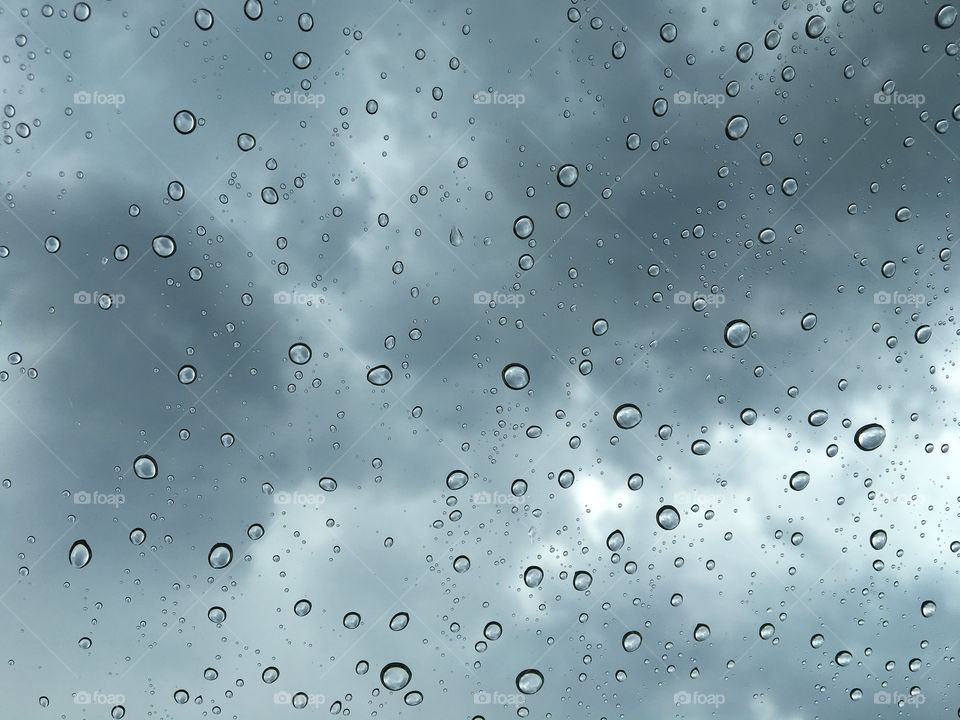 Rain on windshield, close up
