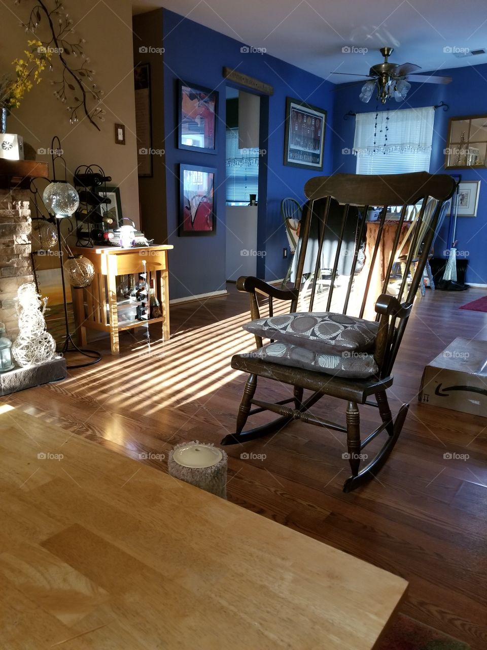 interior with sunlight, rocking chair