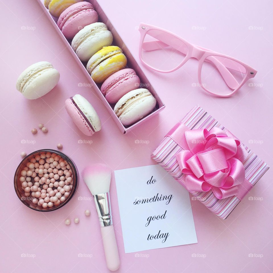 Pink flat lay photography with women’s accessories 