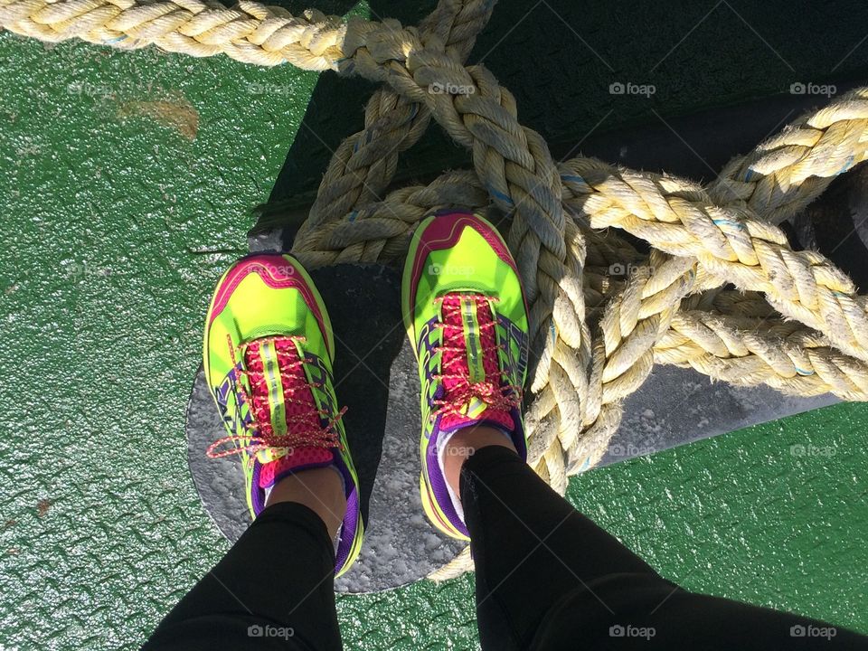 Yellow trail shoes on ferry