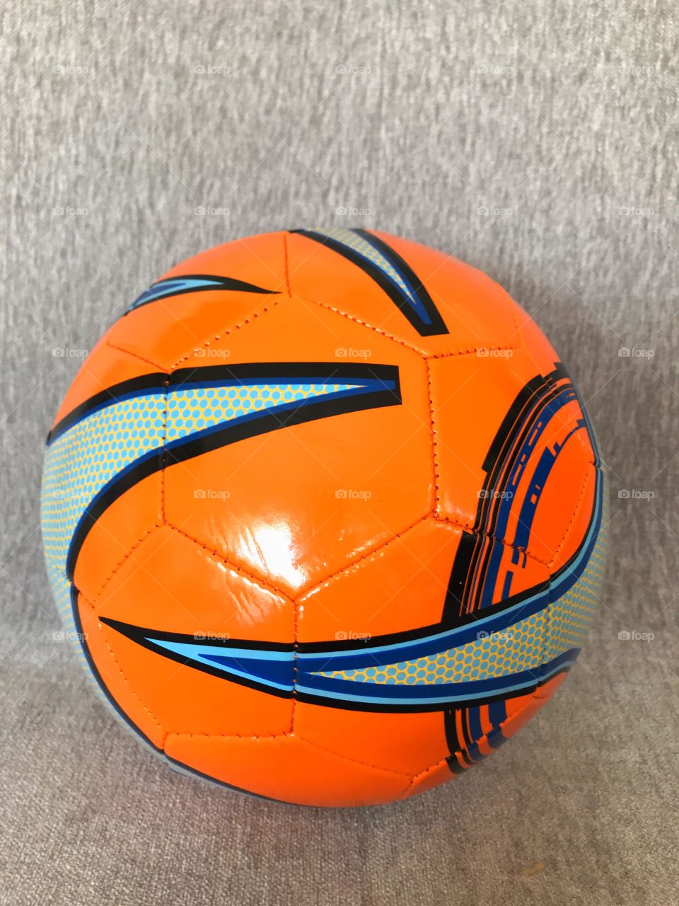 soccer ball on gray background