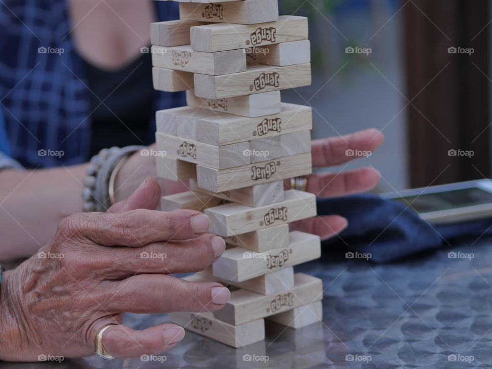 jenga board game hands