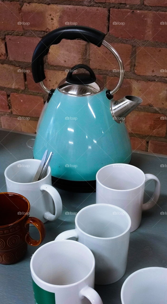 Teapot and mugs ready for tea