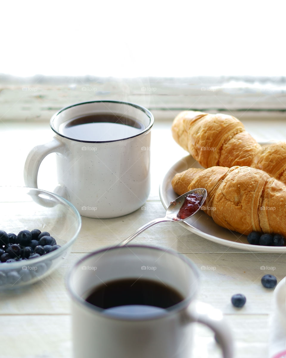 Coffee and croissant for breakfast