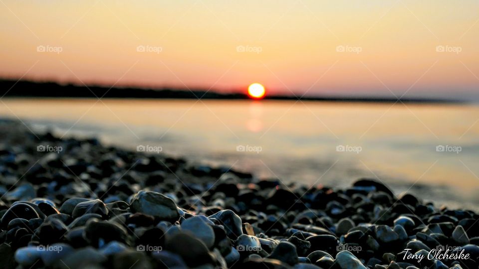 some pebbles and a sunset