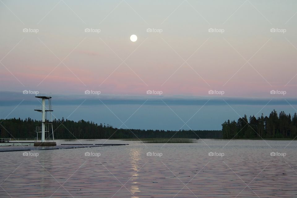 full moon over the water