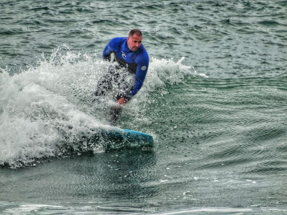 Big Guy Surfing A Big Wave. California Surfing