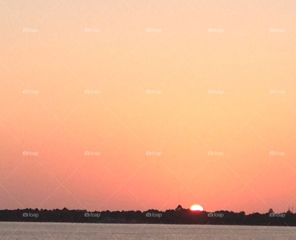 Sunset over Honeymoon Island Florida.
