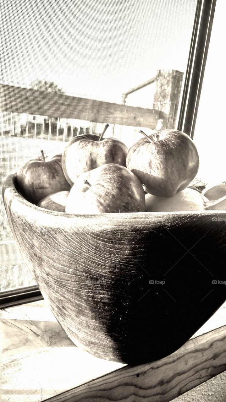 Apples in wood bowl
