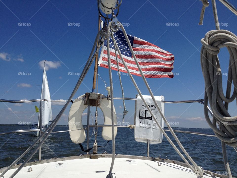American flag while sailing. 