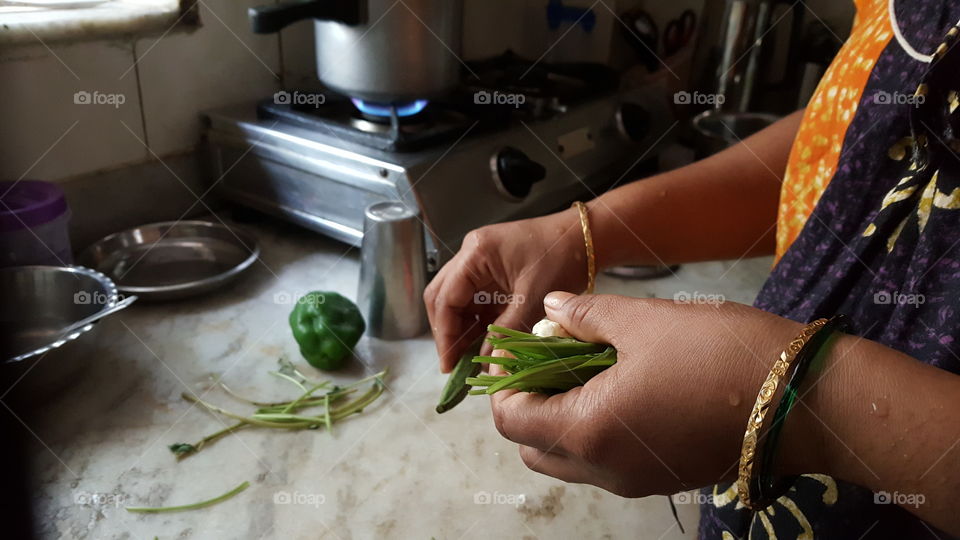 Close-up of a woman preparing food