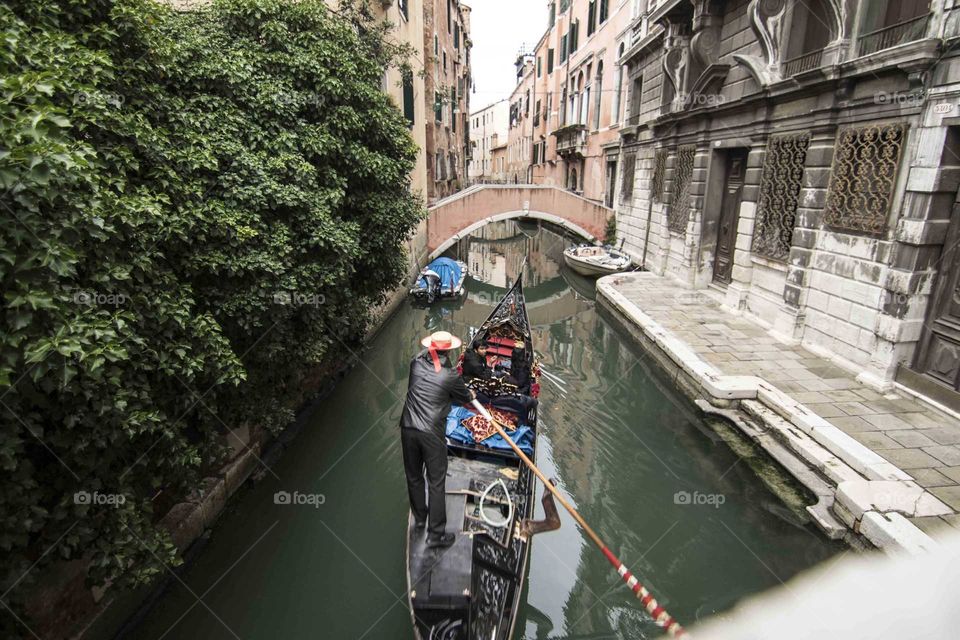 Gondalier on Venice Canal