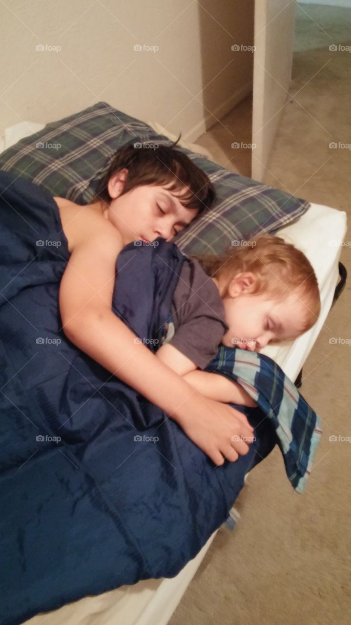 brothers sleeping. exhausting day