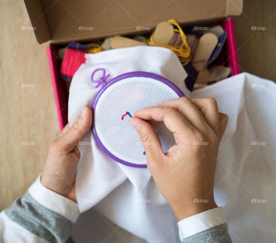 Woman doing embroidery 
