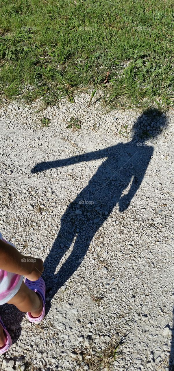 walking shadow. shadow of my daughter walking