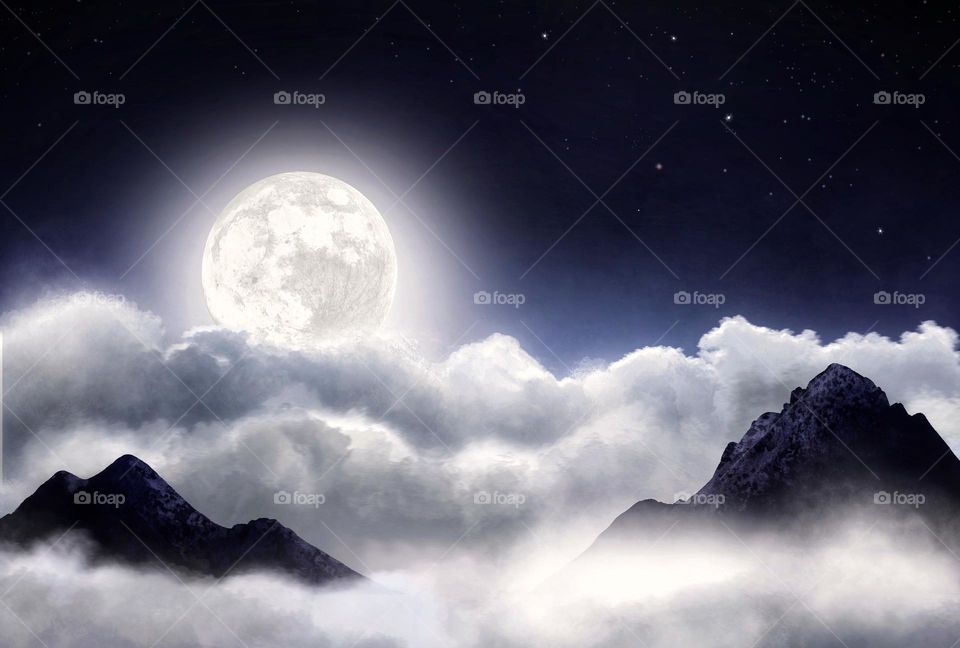 Moonlight over the clouds and mountain 