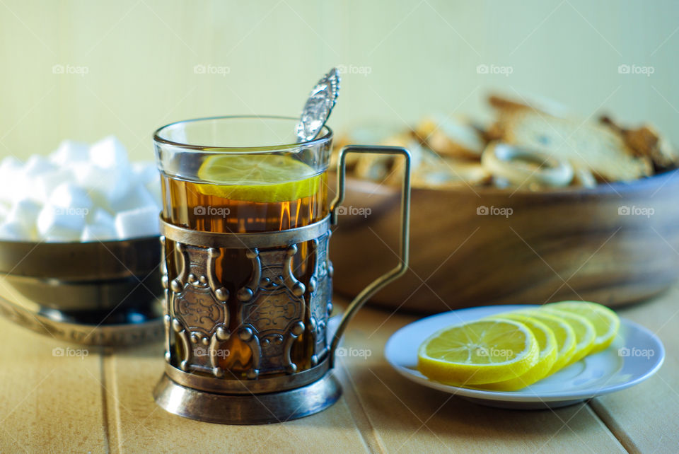 Tea in an old cup holder