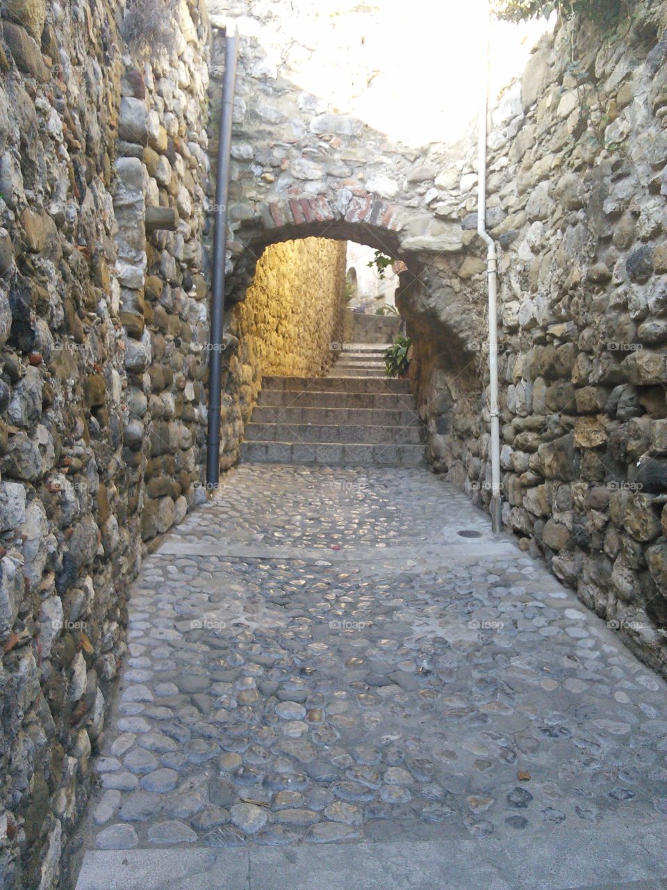 Stone corridor in old Besalu, Cataluña.
