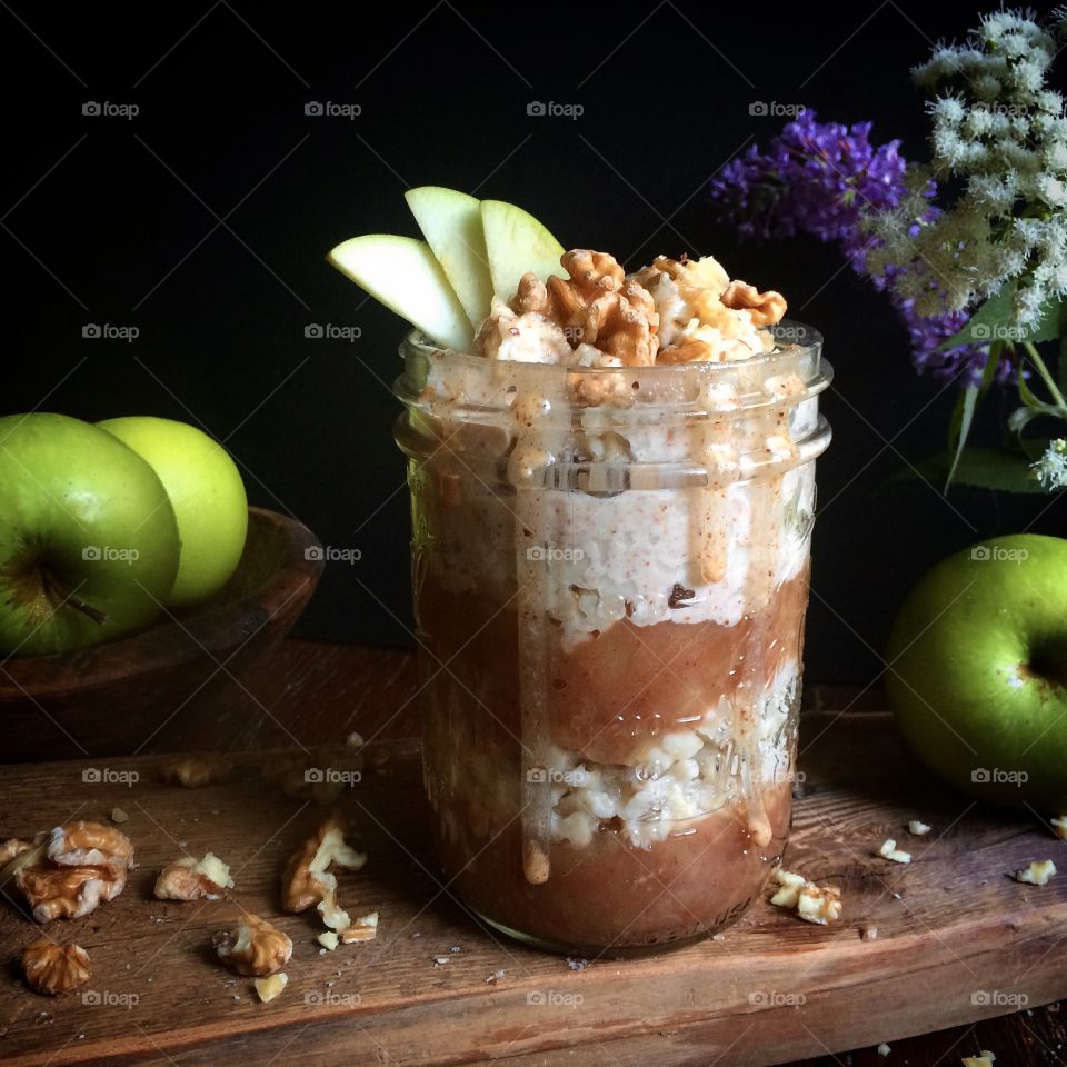 Apple Pie Oatmeal with sliced apples and crushed walnuts. 
