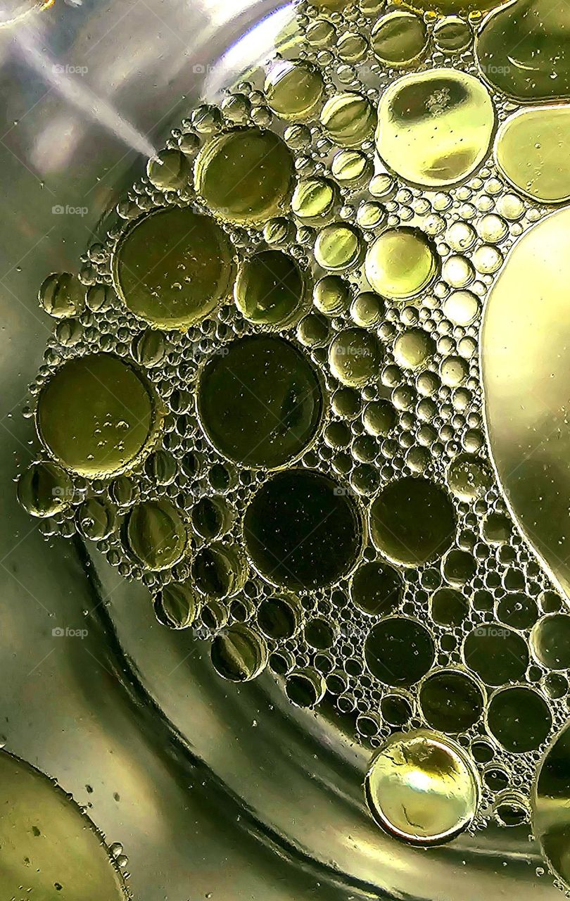 Big circles, little circles and circles in circles; water and oil macro.