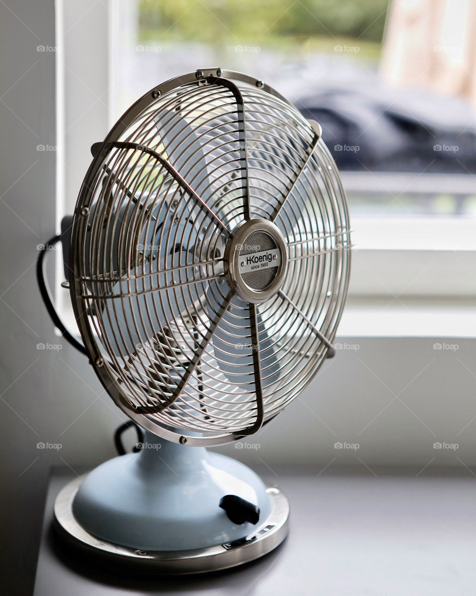 A retro fan in a home office