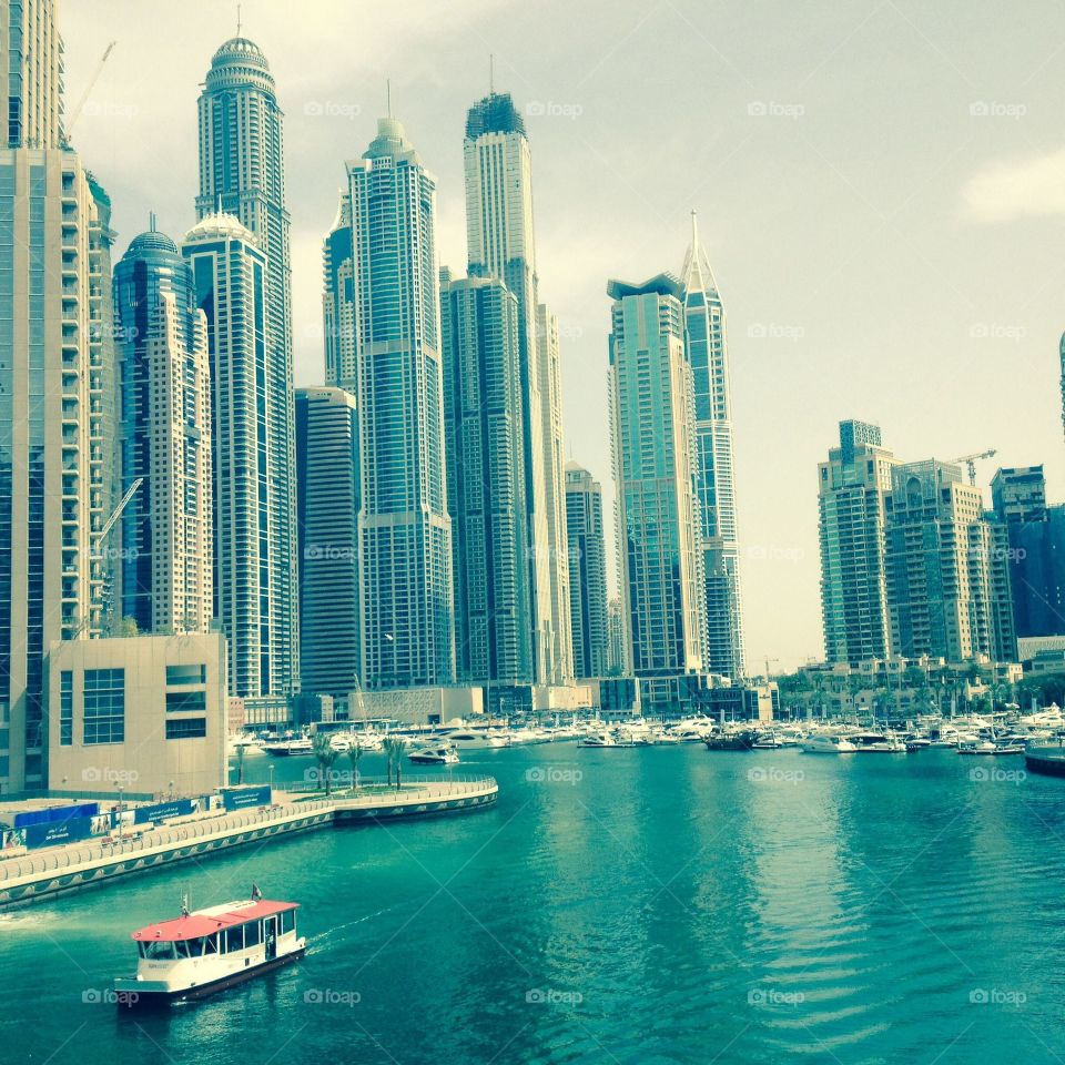 Dubai Marina skyscrapers with luxury boats