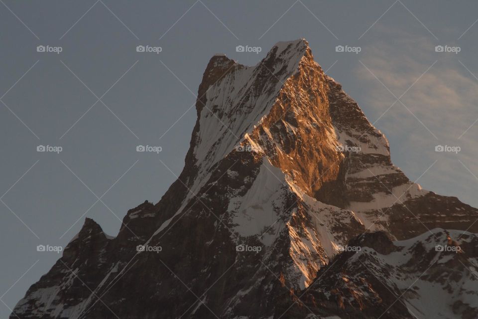 Sunrise view of Machapuchare mountain summit