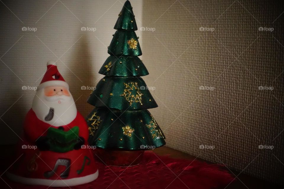 Santa Claus with Christmas tree