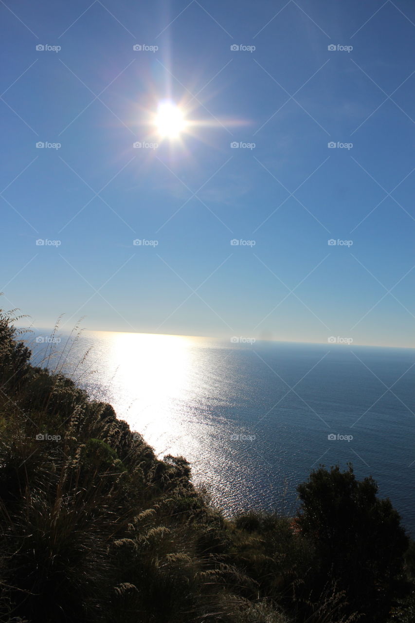Sun light reflecting on the sea. Amalfi Coast,  Italy