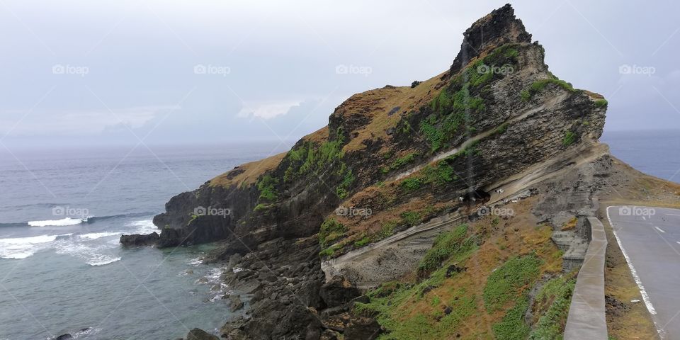 Beautiful cliff beside a tranquil ocean