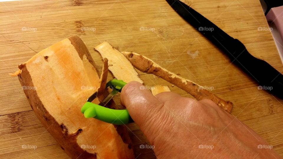 Peeling sweet potatoes