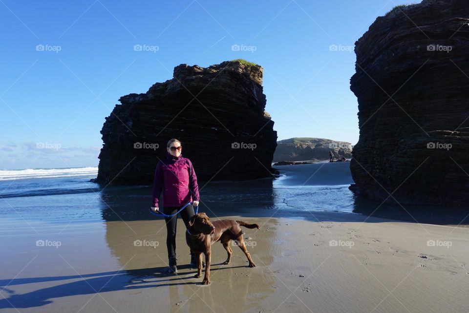 Beach#sea#human#dog