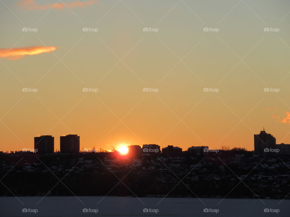 Epiphany evening, sunset in winter over the city