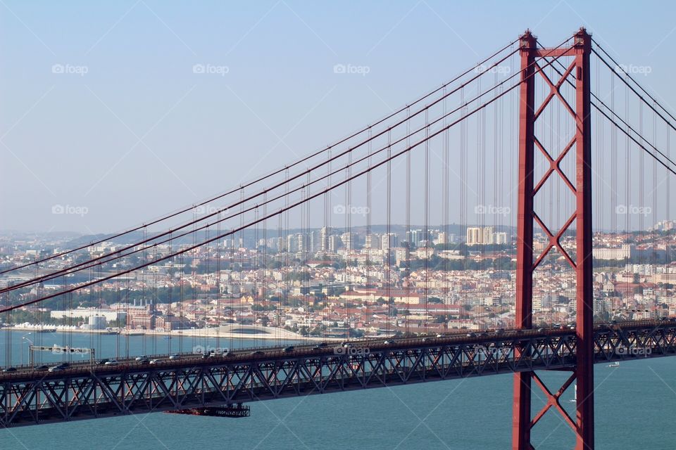 Bridge in Lisbon, Portugal. Bridge 25 de Abril. Ponte 25 de Abril - Lisboa. Lisbon view from the bridge 
