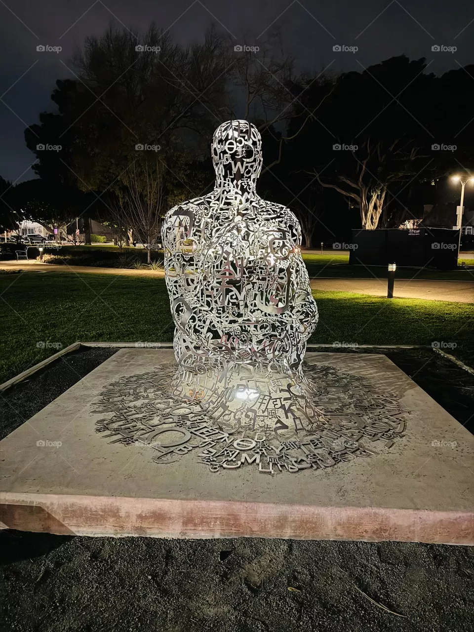 Art Statue, Aluminum Letters made into a man sitting 