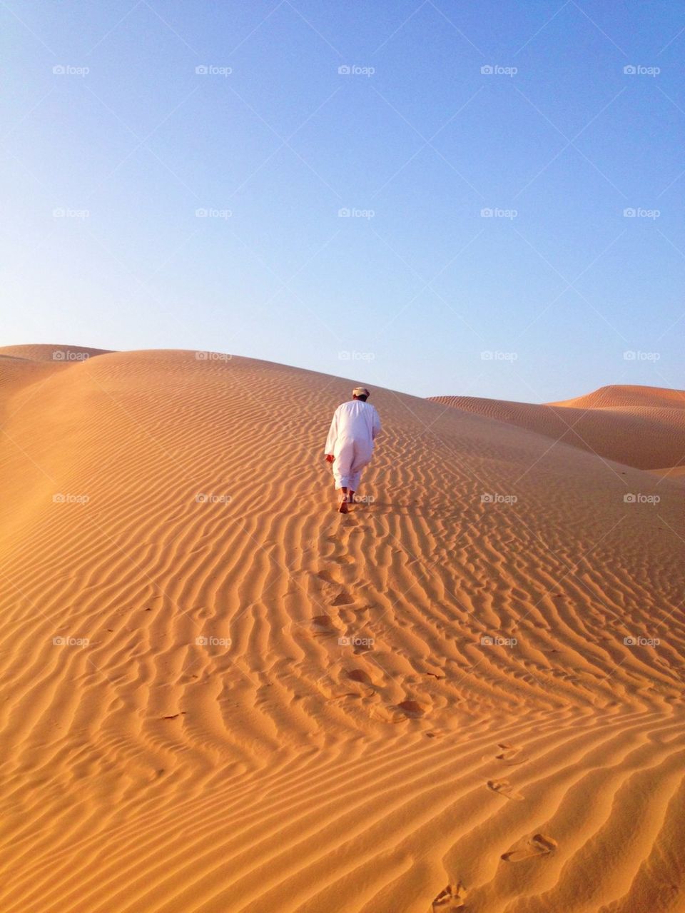 Hiking the sand dunes in Oman