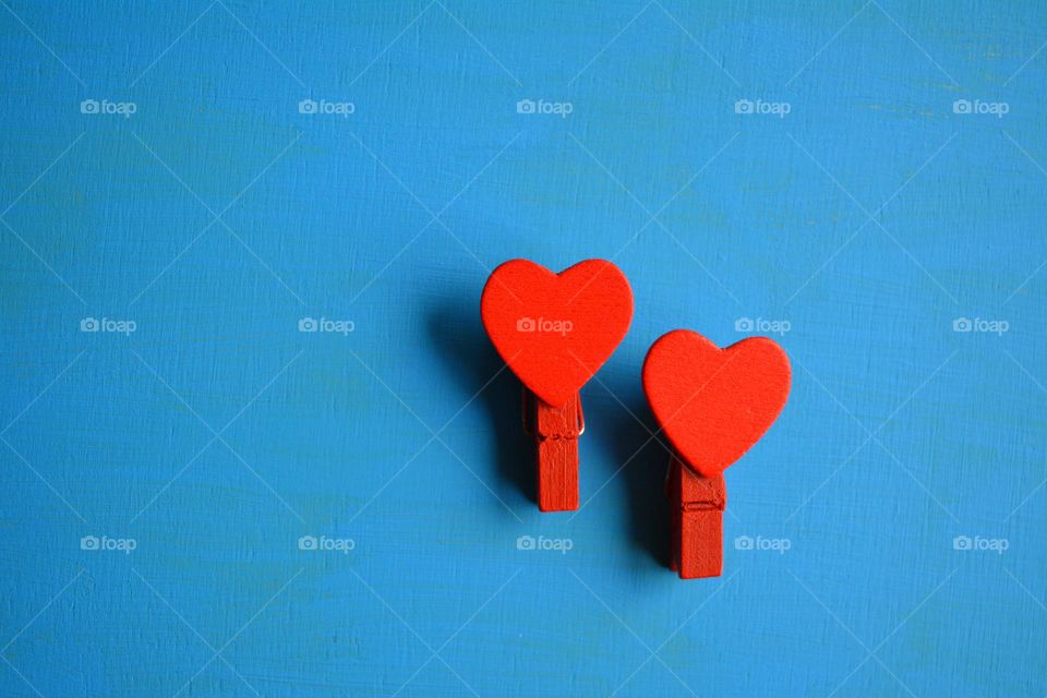 two red hearts on a blue 🔵 background happy valentine's Day, symbol, be happy