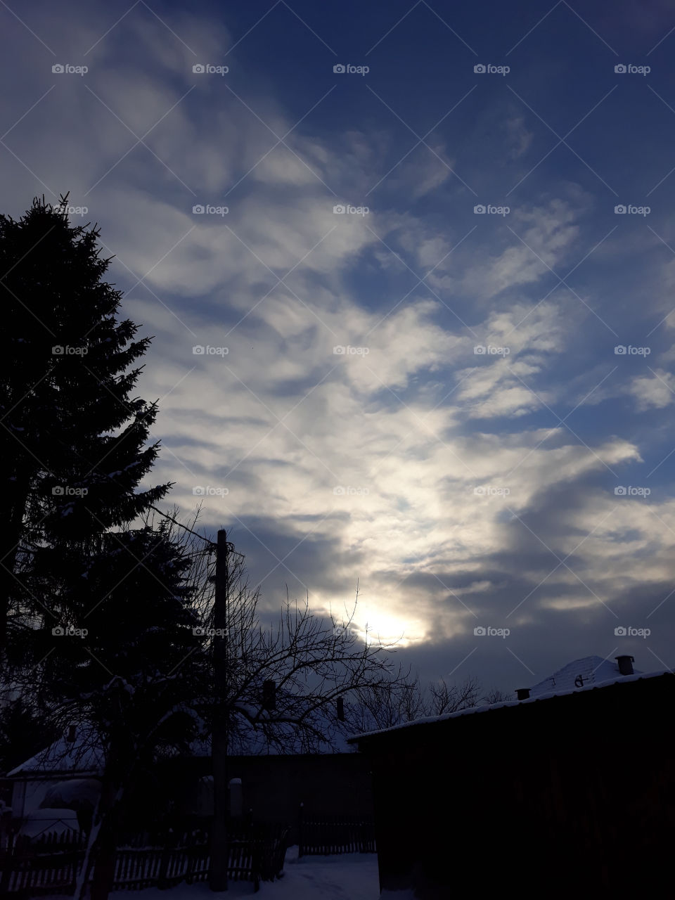 Cloud and sun, winter sky